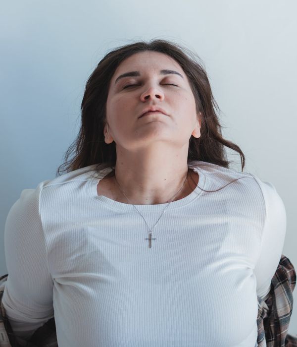 Person looking thoughtfully into the distance, symbolizing mental clarity and focus.